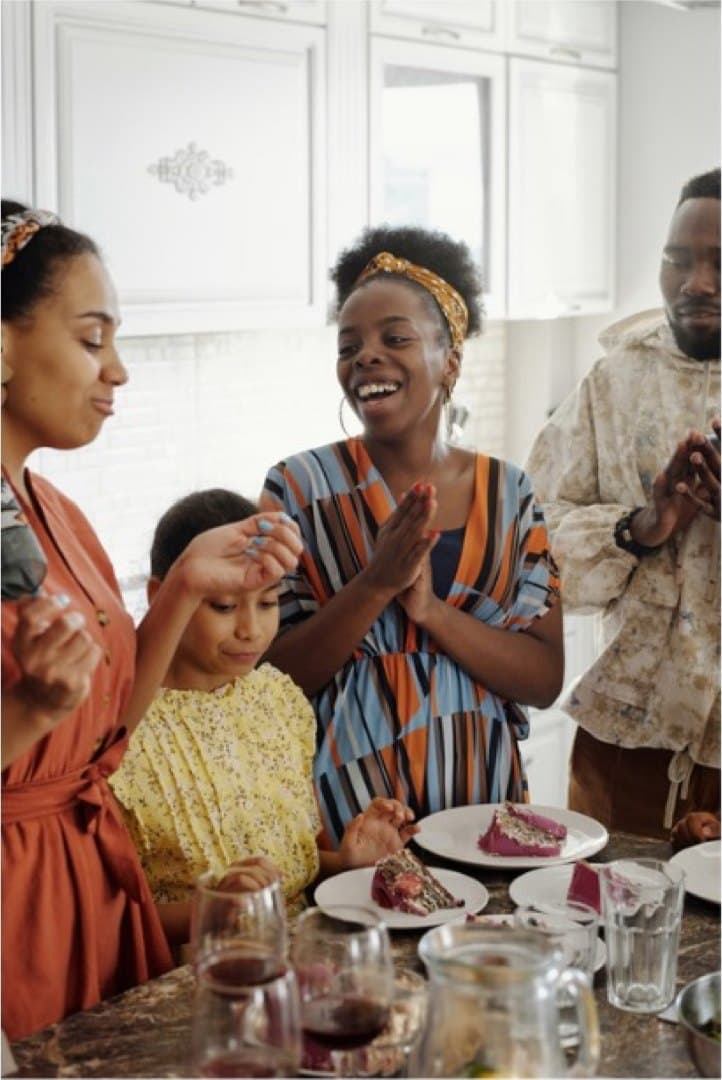 A family shares a warm moment around the table at home.